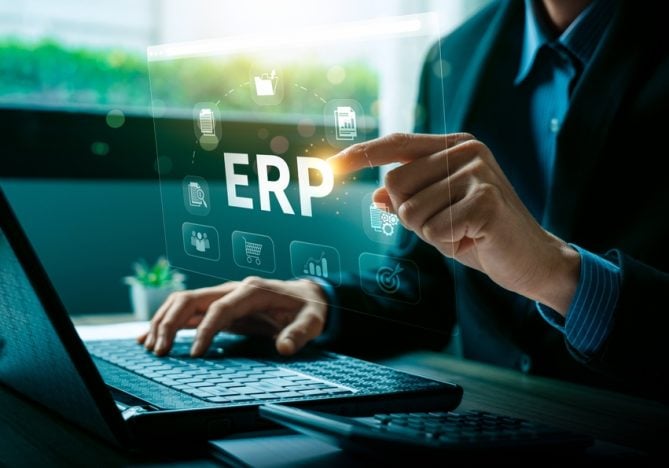 Businessman Using ERP Software System on Virtual Interface, Integrating Business Processes and Data Management Solutions for Efficient Workflow, ERP data icon to analyze marketing technology